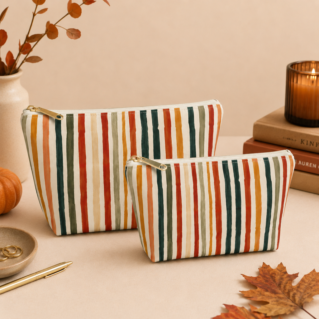 Striped Makeup Bag Travel Organizer Zippered Cosmetic Pouch Portable Beauty Storage Wrist Strap Design Gold Zipper Closure Toiletry Case Perfect Travel Companion Polyester Construction Multi Color Pattern Rust Orange Mustard Yellow Forest
